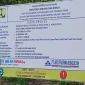 Papan proyek paket Preservasi Jalan Mollo Sujian. 