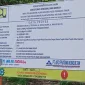 Papan informasi proyek Jalan Mollo Sunjian.